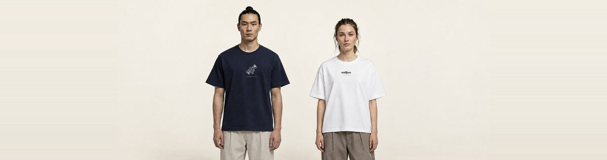 Two models in the heavyweight cotton tee, in navy and white